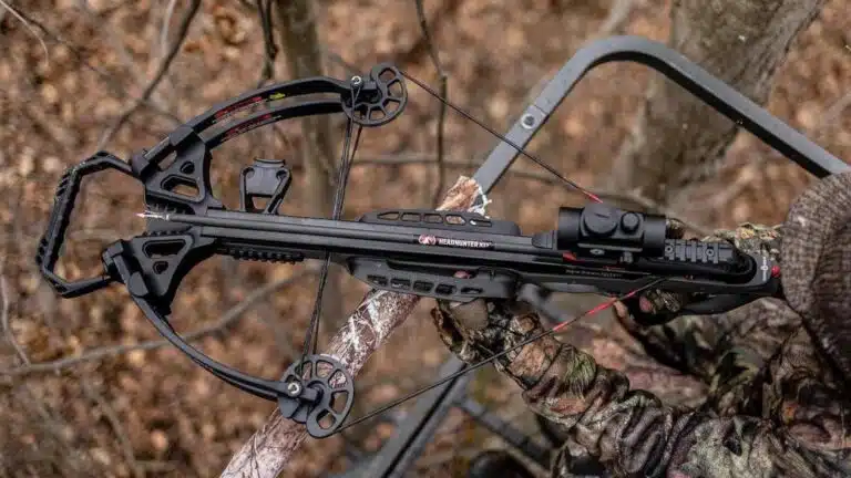 a hunter is using recurve bow type of crossbow for shooting