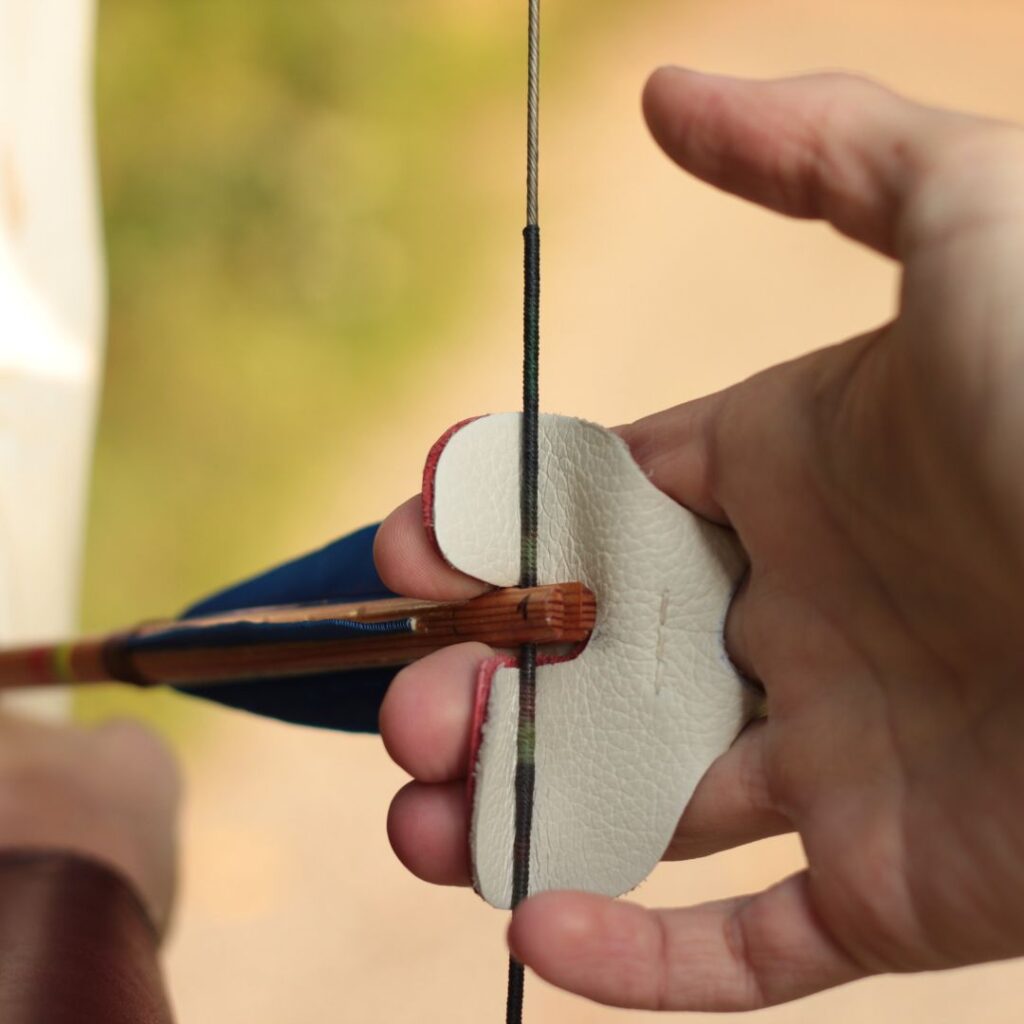 Finger Tab is an essential archery equipment for beginners